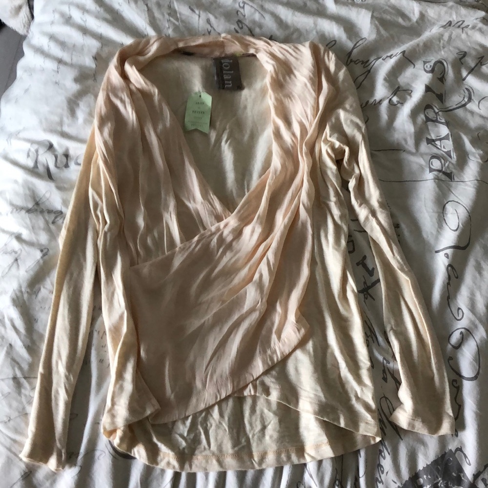 Gorgeous cream Anthro faux wrap top